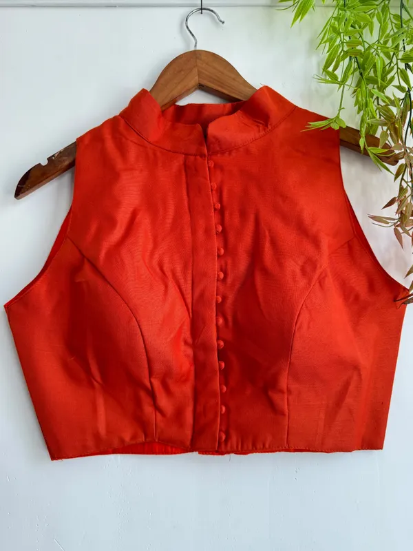 Channeling_royal_vibes_in_a_classic_high-neck_Blouse_silhouette_and_rich_crimson_tones