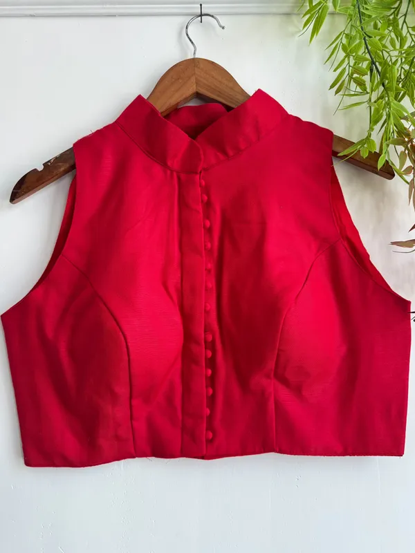 Channeling_royal_vibes_in_a_classic_high-neck_Blouse_silhouette_and_rich_crimson_tones