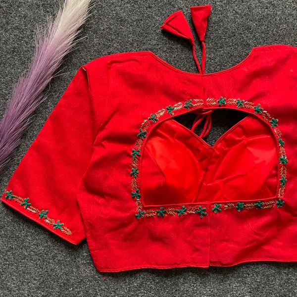 EVALUTE_HALTER_NECK_HEAVY_RAW_SILK_HANDCRAFTED_WORK_FROM__FRONT_AND_BACK_OF_THE_BLOUSE