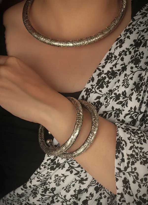 Oxidised_German_Silver_Plated_Rajasthani_Hansli_Necklace_with_Hand_Kadas_–_Traditional_Jewelry_Set_for_a_Royal_Look