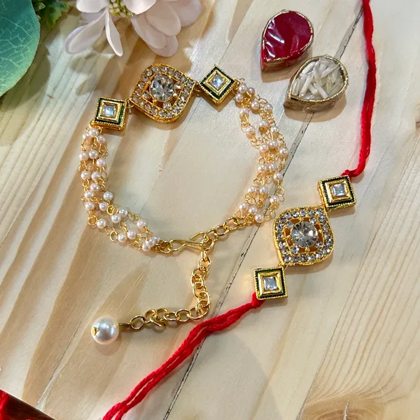 Dhivara_Designer_Bhaiya_Bhabhi_Rakhi_With_Roli_Chawal