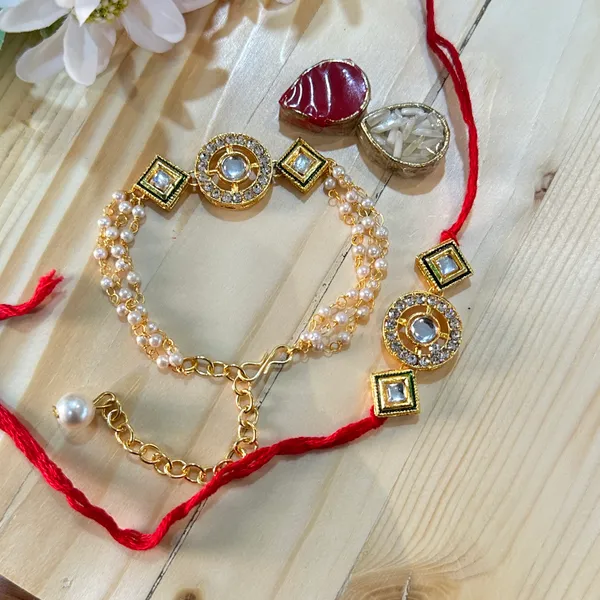 Dhivara_Designer_Bhaiya_Bhabhi_Rakhi_With_Roli_Chawal