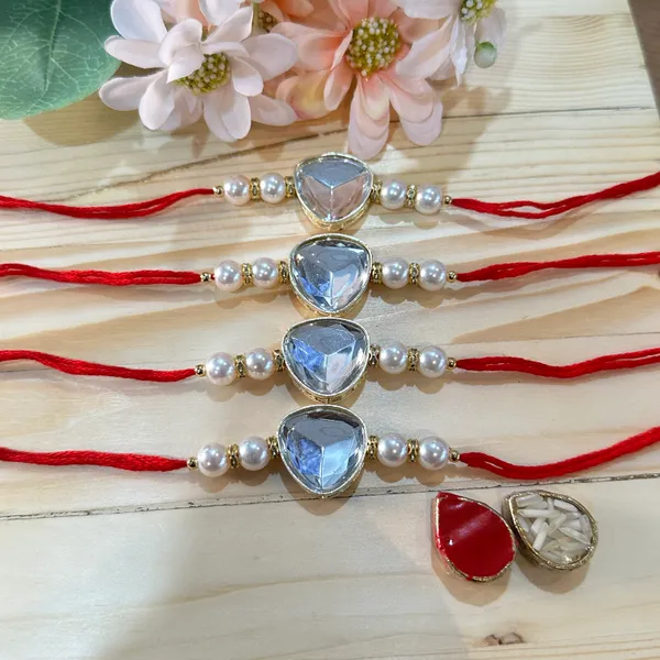 Dhivara_Kundan_Rakhi_With_Roli_Chawal_Pack_Of_4