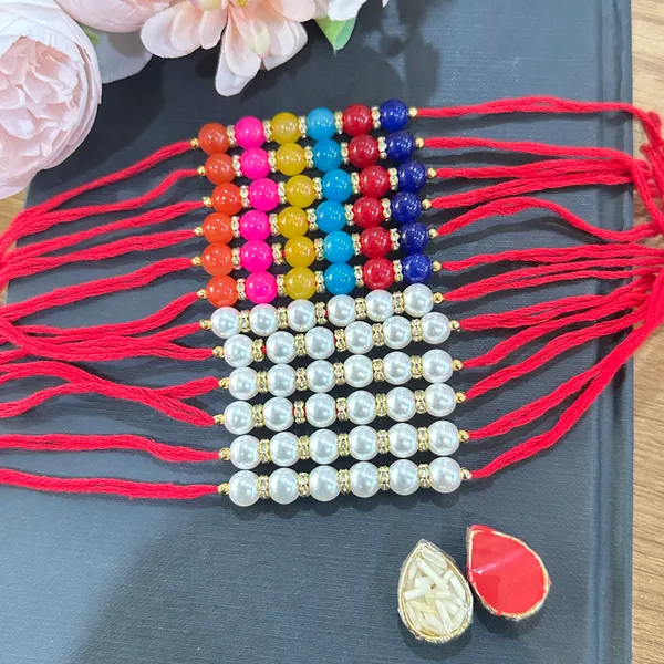 Dhivara_Pearl_Rakhi_Combo_/_Pack_Of_12_Rakhi_With_Roli_Chawal