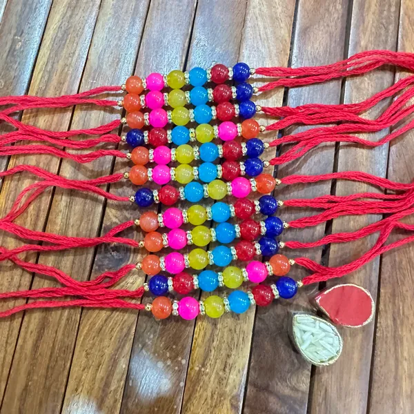 Dhivara_Pearl_Rakhi_Combo_/_Pack_Of_12_Rakhi_With_Roli_Chawal