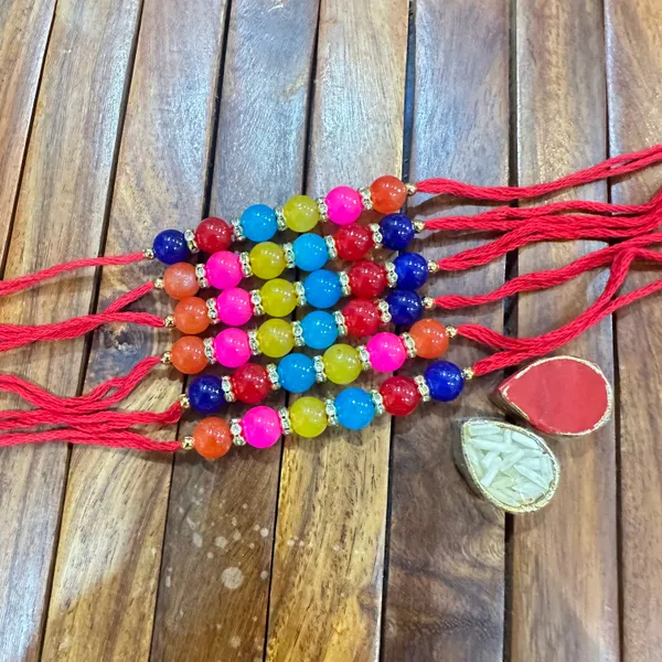 Dhivara_Pearl_Rakhi_Combo_/_Pack_Of_6_Rakhi_With_Roli_Chawal