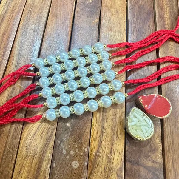 Dhivara_Pearl_Rakhi_Combo_/_Pack_Of_6_Rakhi_With_Roli_Chawal