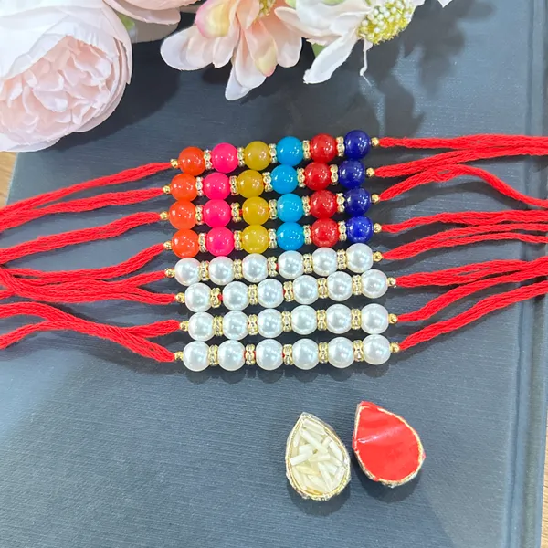 Dhivara_Pearl_Rakhi_Combo_/_Pack_Of_8_Rakhi_With_Roli_Chawal