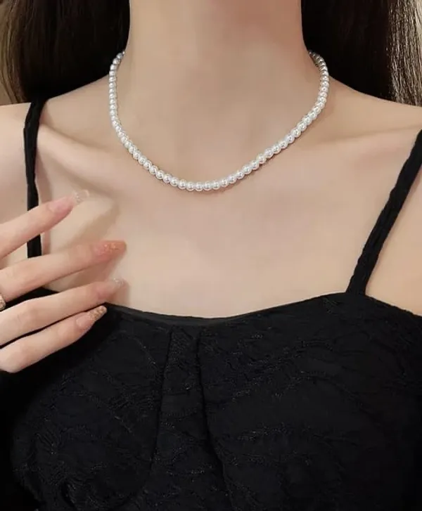 https://d1311wbk6unapo.cloudfront.net/NushopCatalogue/tr:f-webp,w-600,fo-auto/65b7523602d8dc3ec1da33d5/cat_img/Dhivara_White_Pearl_Necklace_Set_LSGS6137TF_2024-09-28_1.JPG__DHIVARA