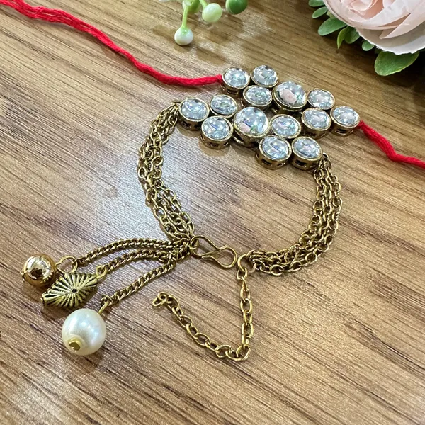 Dhivara_Designer_Bhaiya_Bhabhi_Rakhi_With_Roli_Chawal_(1_Bhabhi_Rakhi,_1_Bhaiya_Rakhi,_Roli_Chawal)