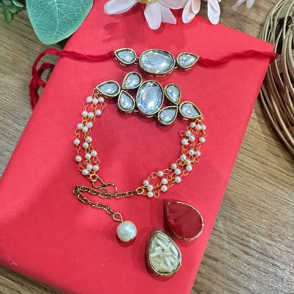 Dhivara_Designer_Bhaiya_Bhabhi_Rakhi_With_Roli_Chawal_(1_Bhabhi_Rakhi,_1_Bhaiya_Rakhi,_Roli_Chawal)