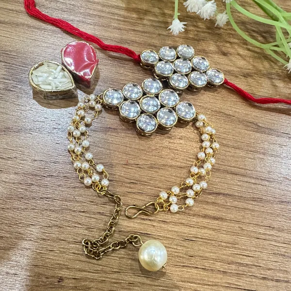Dhivara_Designer_Bhaiya_Bhabhi_Rakhi_With_Roli_Chawal_(1_Bhabhi_Rakhi,_1_Bhaiya_Rakhi,_Roli_Chawal)