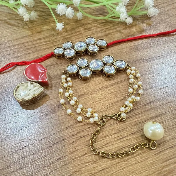 Dhivara_Designer_Bhaiya_Bhabhi_Rakhi_With_Roli_Chawal_(1_Bhabhi_Rakhi,_1_Bhaiya_Rakhi,_Roli_Chawal)