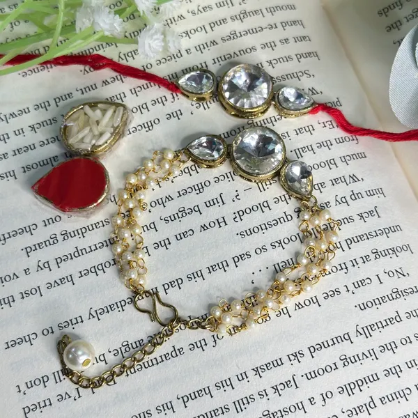 Dhivara_Designer_Bhaiya_Bhabhi_Rakhi_With_Roli_Chawal_(1_Bhabhi_Rakhi,_1_Bhaiya_Rakhi,_Roli_Chawal)