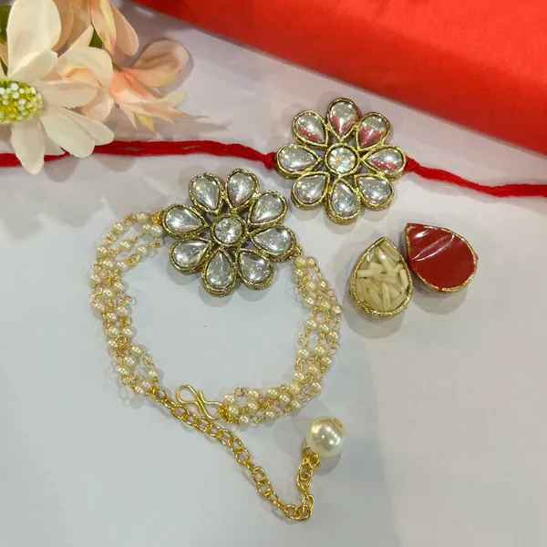 Dhivara_Designer_Bhaiya_Bhabhi_Rakhi_With_Roli_Chawal_(1_Bhabhi_Rakhi,_1_Bhaiya_Rakhi,_Roli_Chawal)