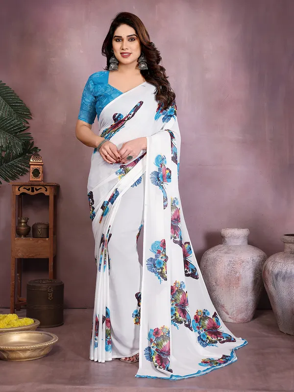 Printed_Georgette_saree_With_Unstitched_Blouse_Piece_(Blue)