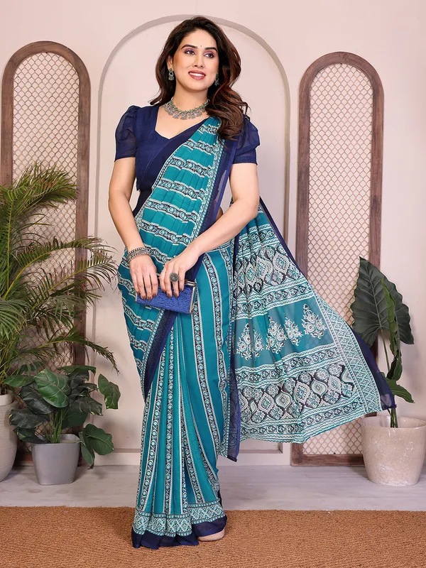 Printed_Georgette_Saree_With_UnStitched_Blouse_Piece_(BLUE)