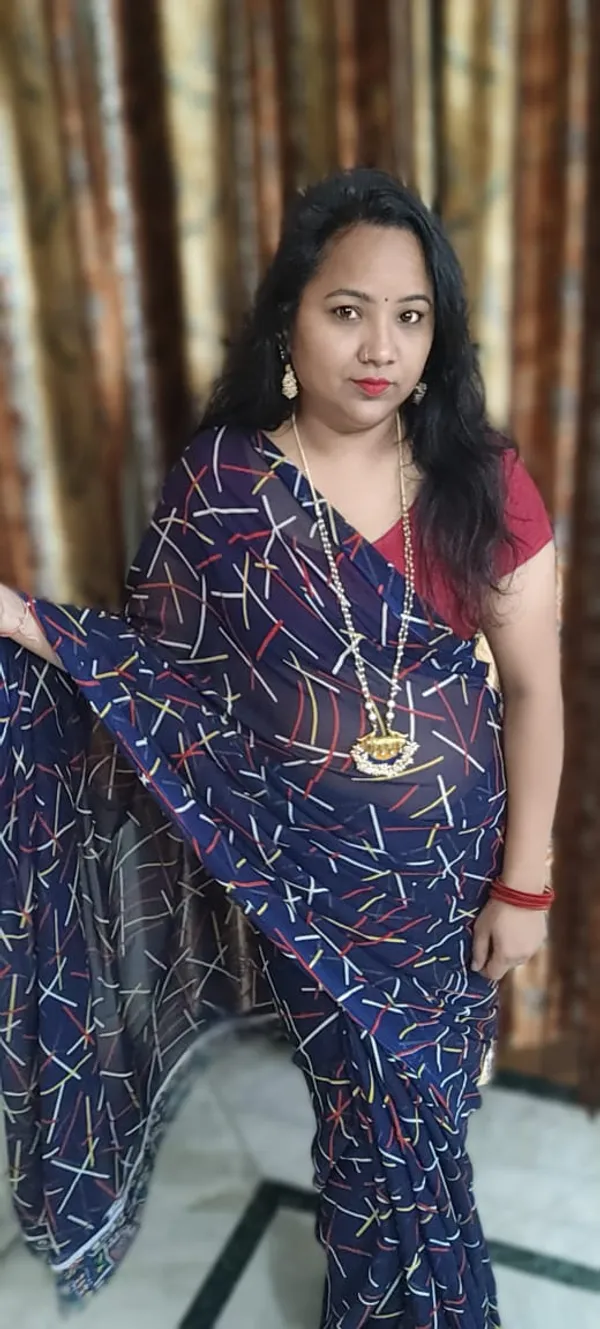 Elegant_Printed_Georgette_Saree_With_Unstitched_Blouse