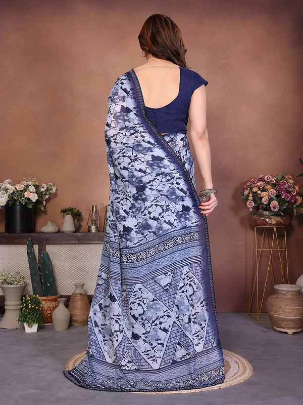 Printed_Lace_Border_Saree_With_UnStitched_Blouse_Piece_(BLUE)