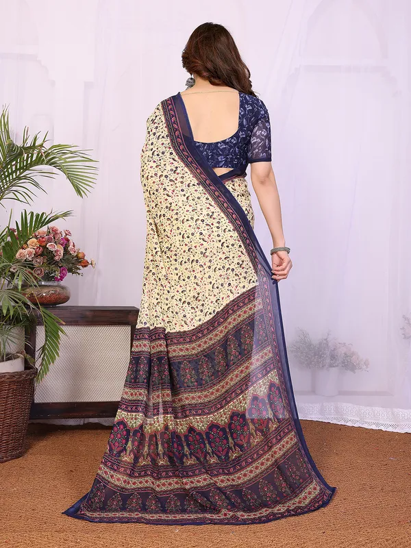 Printed_Georgette_Saree_With_UnStitched_Blouse_Piece_(BLUE)