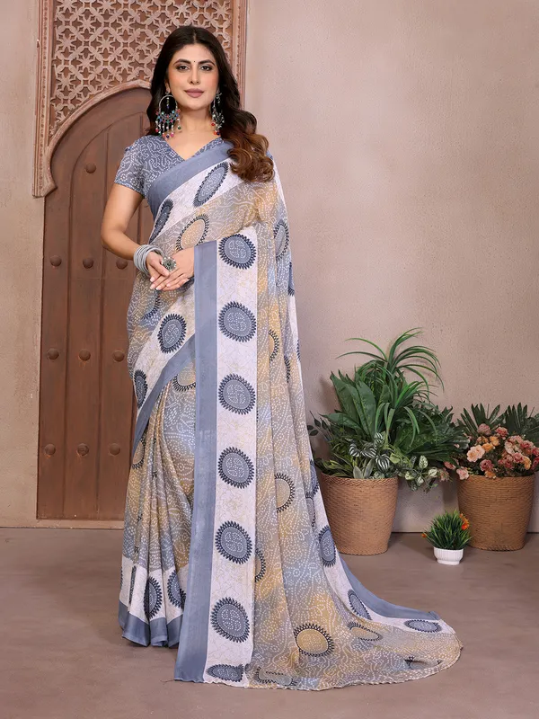 Elegant_Moss_Georgette_Saree_With_Unstitched_Blouse_Piece