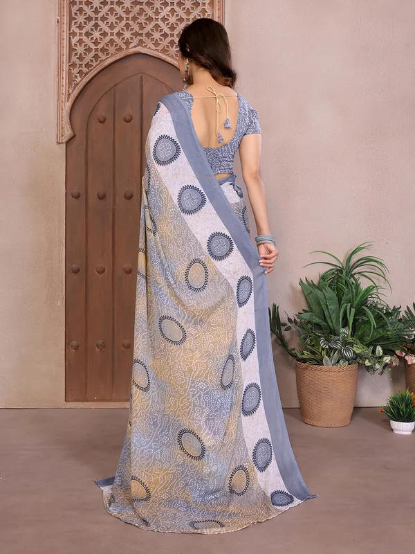 Elegant_Moss_Georgette_Saree_With_Unstitched_Blouse_Piece