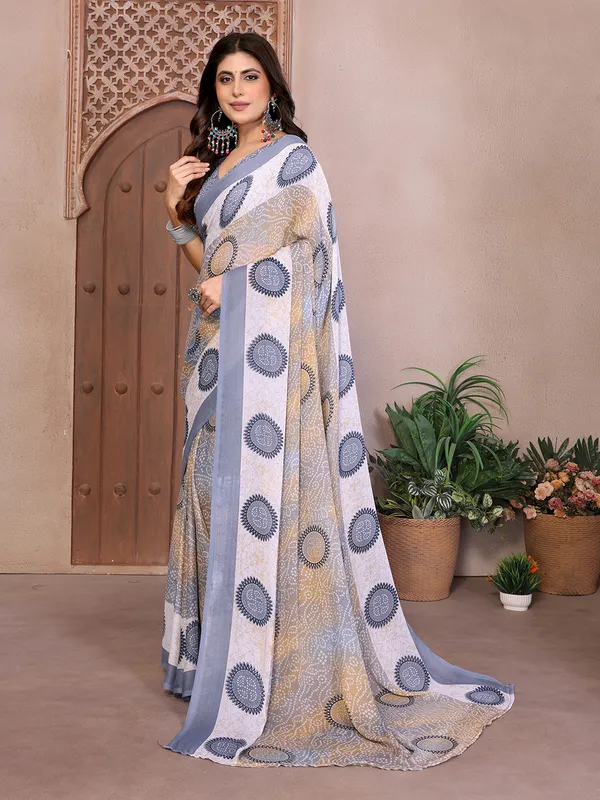 Elegant_Moss_Georgette_Saree_With_Unstitched_Blouse_Piece