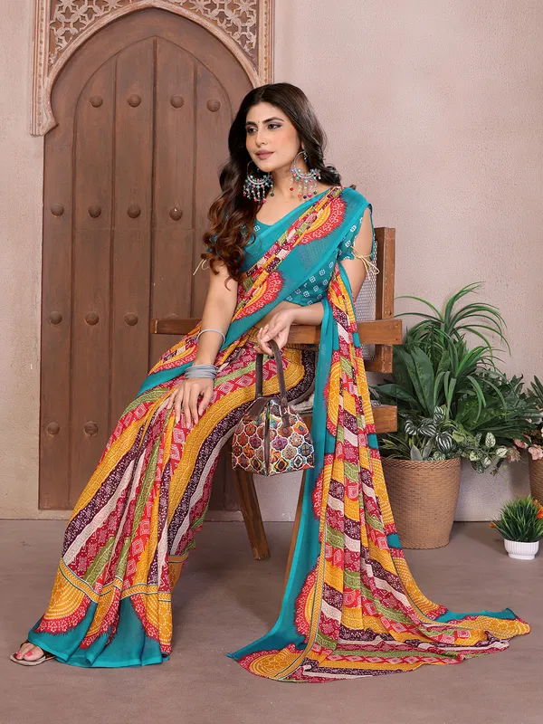 Elegant_Moss_Georgette_Saree_With_Unstitched_Blouse_Piece