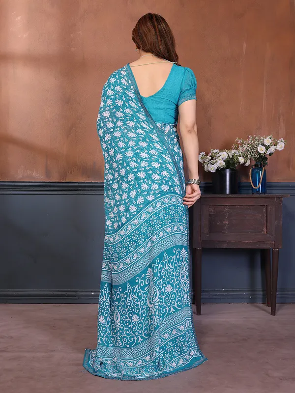 Printed_Lace_Border_Saree_With_UnStitched_Blouse_Piece_(Aqua)