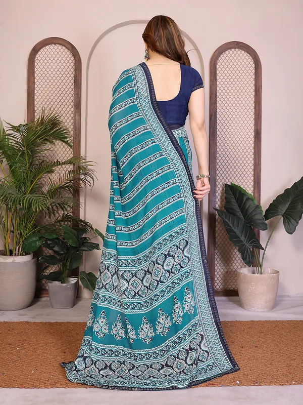 Printed_Lace_Border_Saree_With_UnStitched_Blouse_Piece_(BLUE)