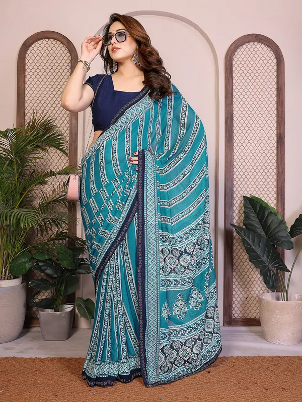 Printed_Lace_Border_Saree_With_UnStitched_Blouse_Piece_(BLUE)