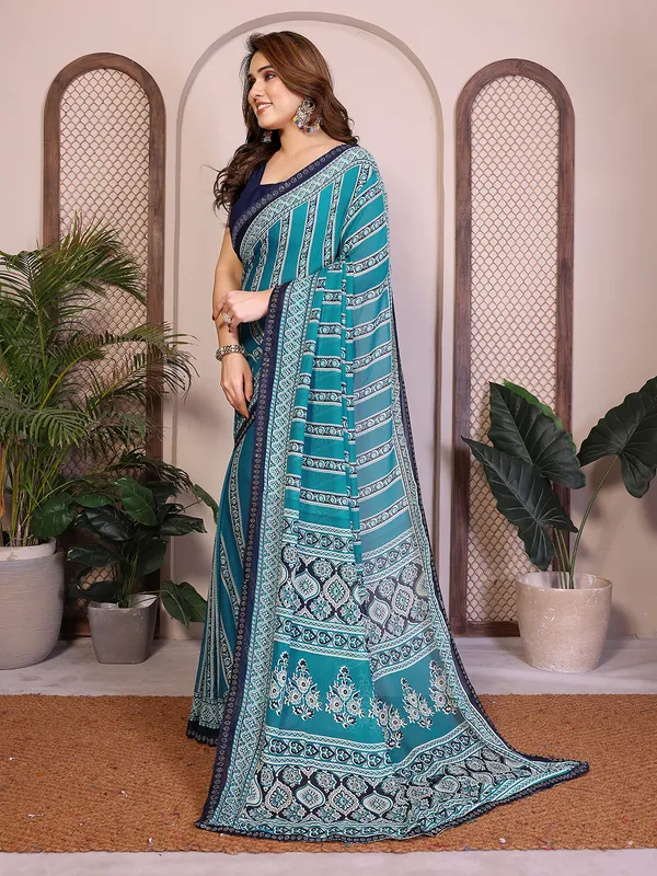 Printed_Lace_Border_Saree_With_UnStitched_Blouse_Piece_(BLUE)