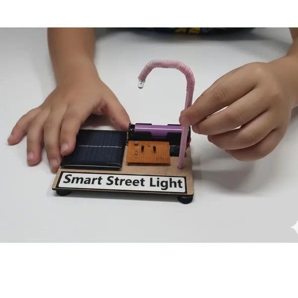 Automatic_Smart_Solar_Panel_Street_Light_Science_Project_Kit_Working_Model_Using_LDR_and_ON_&_Off_Sensor_System_STEM_Learning_for_School_Kids_Projects