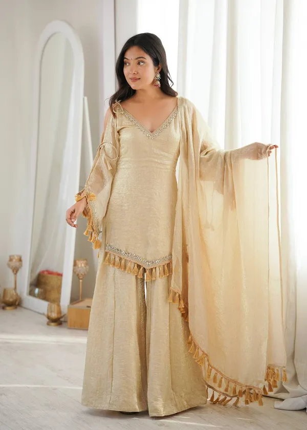 Riddhilya_Women's_Golden_Beige_Embellished_Kurta_Palazzo_Set_with_Tassel_Dupatta_|_Festive_&_Party_Wear_Ethnic_Suit