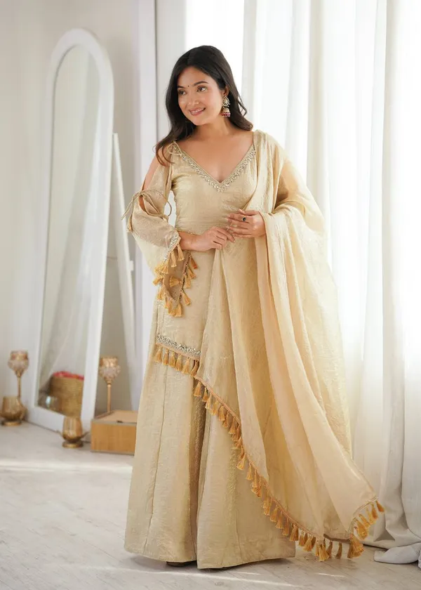 Riddhilya_Women's_Golden_Beige_Embellished_Kurta_Palazzo_Set_with_Tassel_Dupatta_|_Festive_&_Party_Wear_Ethnic_Suit