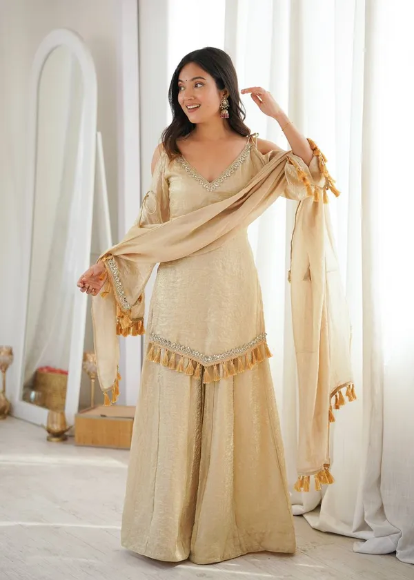 Riddhilya_Women's_Golden_Beige_Embellished_Kurta_Palazzo_Set_with_Tassel_Dupatta_|_Festive_&_Party_Wear_Ethnic_Suit
