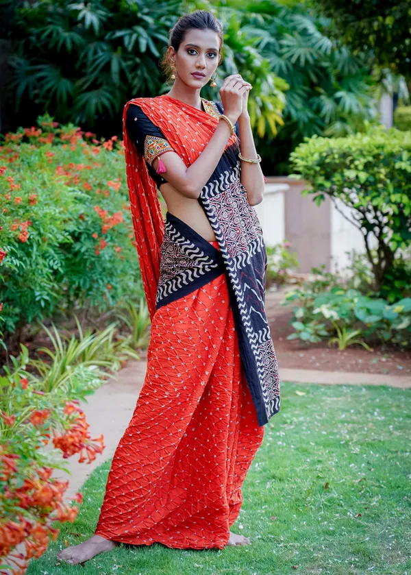 Beautiful_Orange_Cotton_Saree_With_Exclusive_Ajrakh_&_Bandhej_Combination