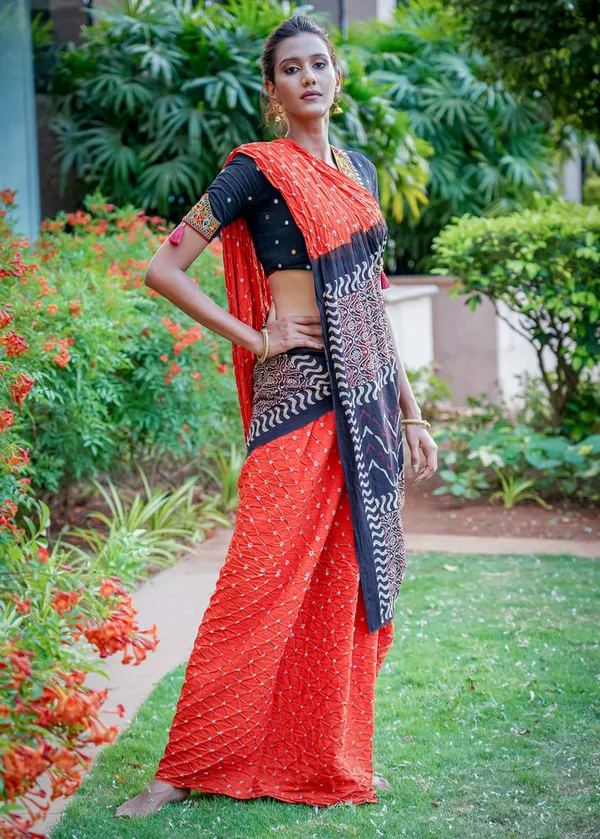 Beautiful_Orange_Cotton_Saree_With_Exclusive_Ajrakh_&_Bandhej_Combination