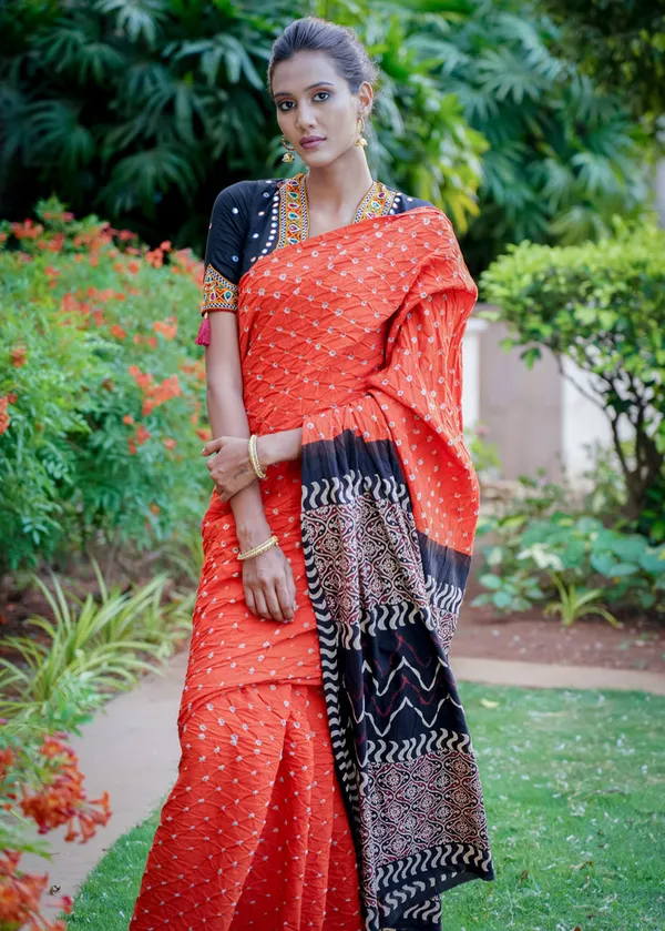 Beautiful_Orange_Cotton_Saree_With_Exclusive_Ajrakh_&_Bandhej_Combination