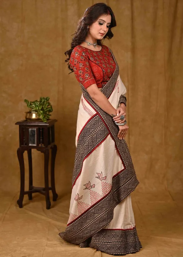 Cream_Cotton_Saree_with_Elegant_Ajrakh_Border_and_Gond_Painting