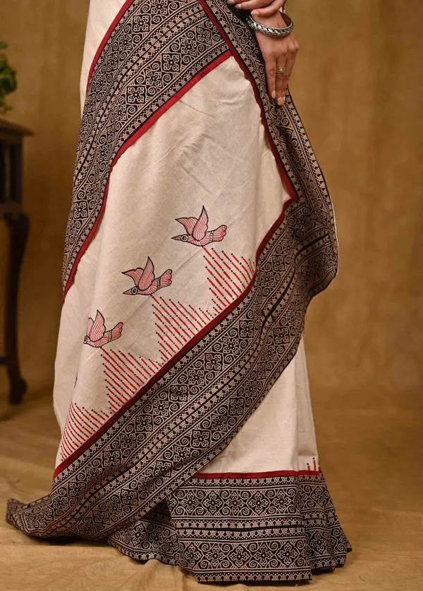 Cream_Cotton_Saree_with_Elegant_Ajrakh_Border_and_Gond_Painting