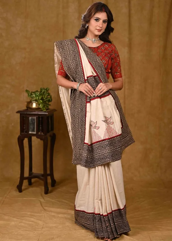 Cream_Cotton_Saree_with_Elegant_Ajrakh_Border_and_Gond_Painting