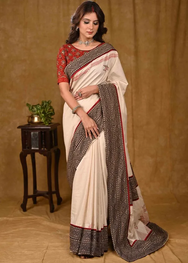 Cream_Cotton_Saree_with_Elegant_Ajrakh_Border_and_Gond_Painting