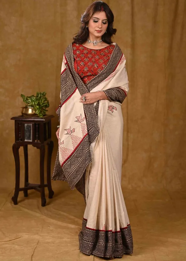 Cream_Cotton_Saree_with_Elegant_Ajrakh_Border_and_Gond_Painting