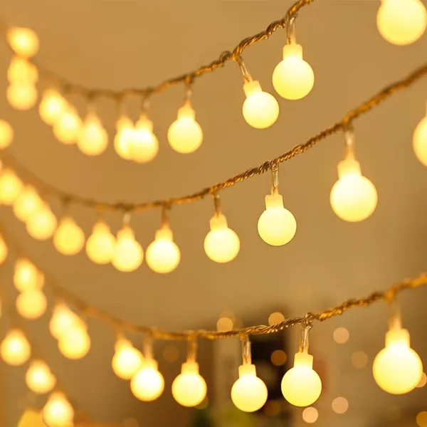 RSP_Candela_14_LED_3_m_Yellow_Steady_Ball_Rice_Lights._Warm_White__LED_Lights_for_Decoration,_Diwali_Lights_for_Bedroom,_Balcony,_Party,_Christmas,_Home,_Main_Door_&_Outdoor_Use