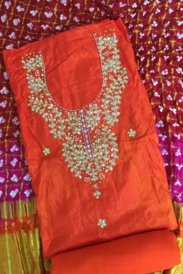 Four_piece_orange_Unstitched_Art_Silk_Suits