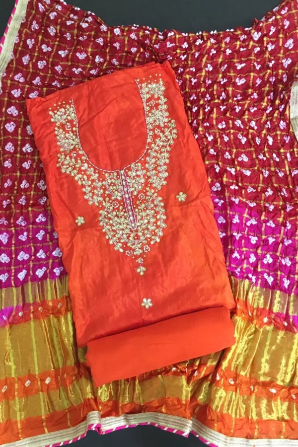 Four_piece_orange_Unstitched_Art_Silk_Suits