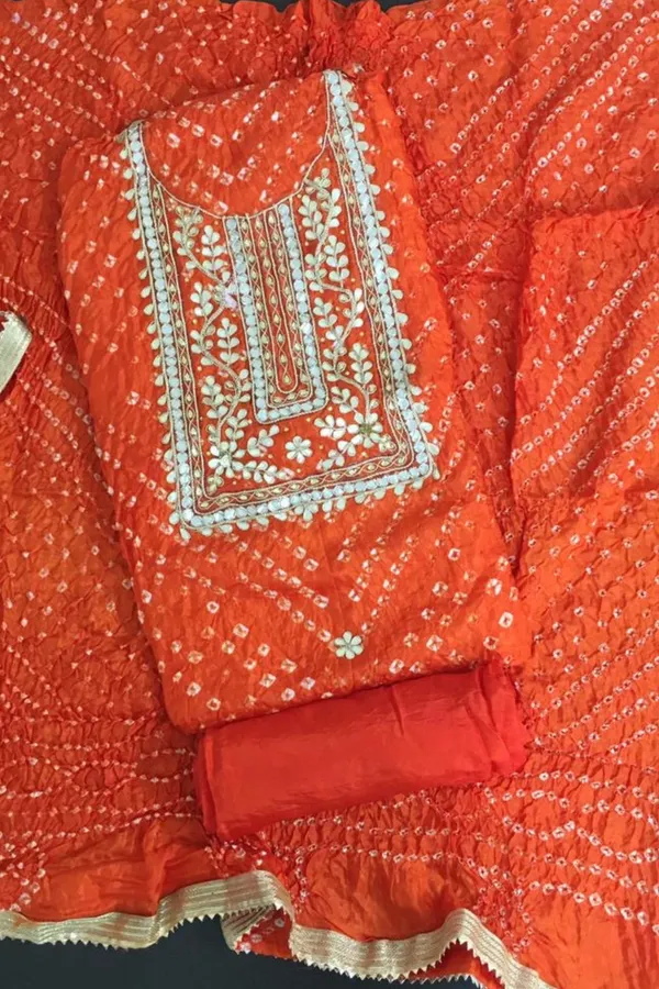 Four_piece_orange_Unstitched_Art_Silk_Suits