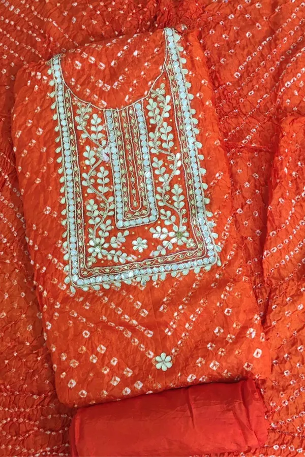 Four_piece_orange_Unstitched_Art_Silk_Suits