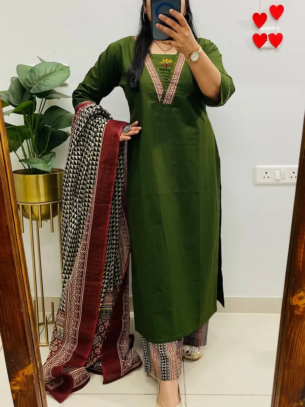 Dhabu_cotton_suit_set_with_heavy_embroidery_work_on_the_yoke_and_pockets__with_border_detailing_on_Sleeves.